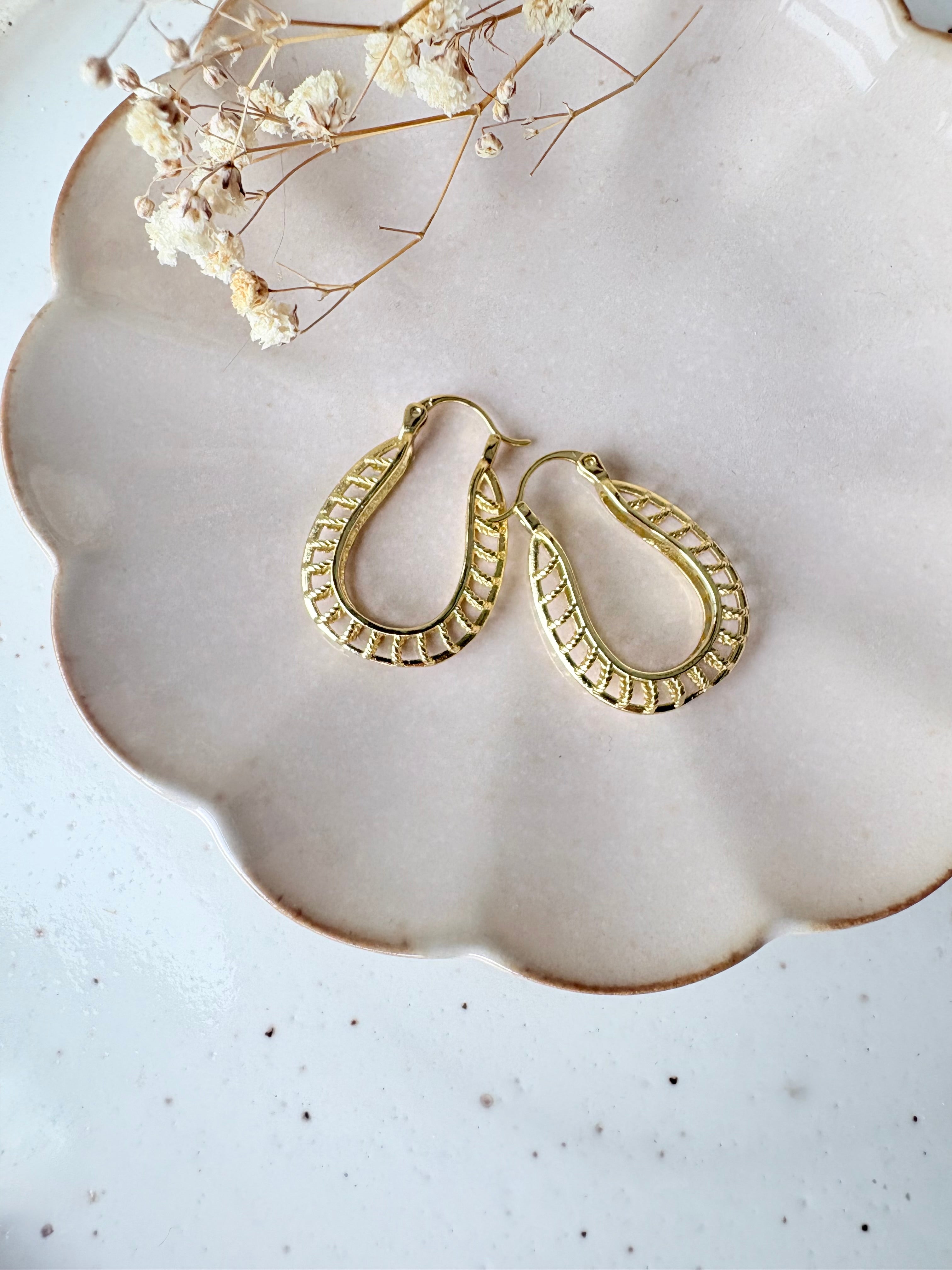 Boucles Gouttes Signature